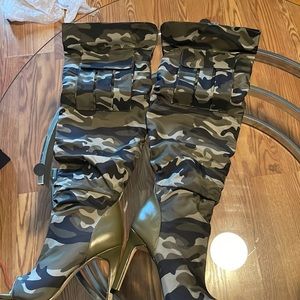 Brand new heeled knee boots, camouflage in color, size 8. $45